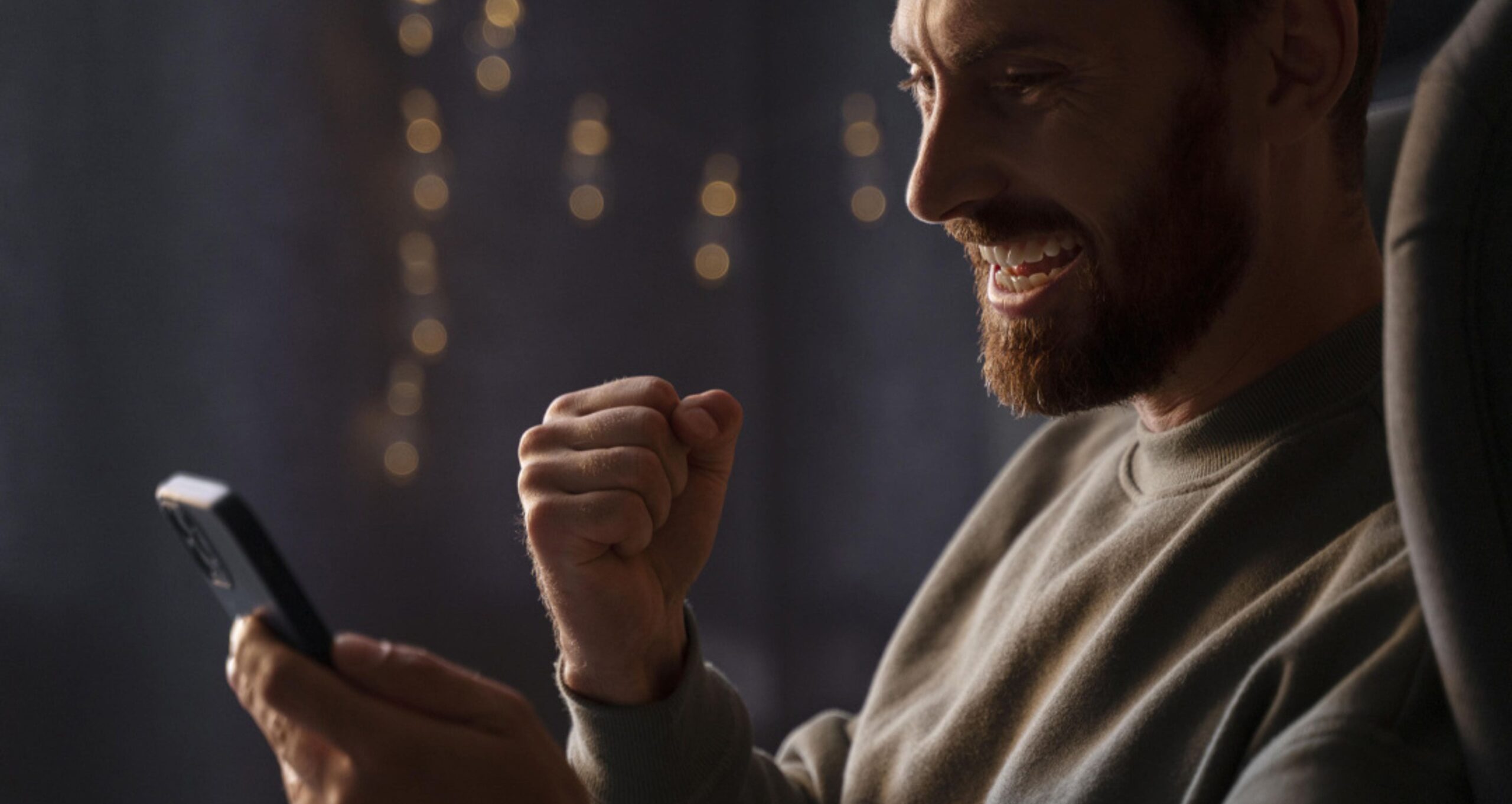 A boy using a smartphone with eSIM technology, demonstrating seamless connectivity and remote provisioning for IoT devices.