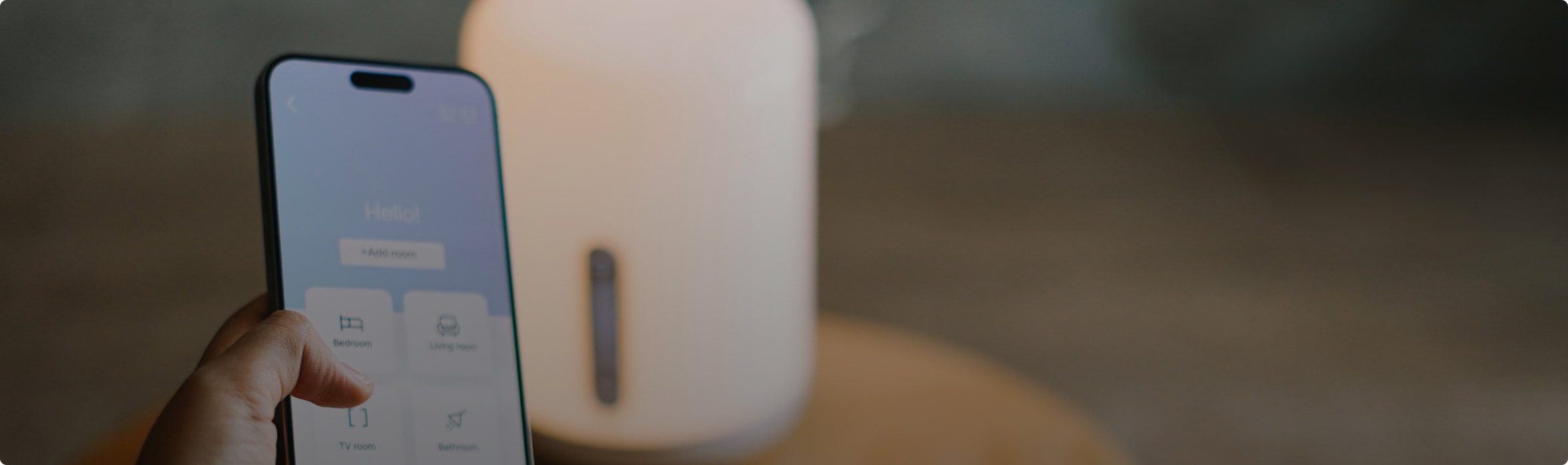 Mobile device with eSIM technology connecting wirelessly to a speaker for seamless IoT audio streaming.